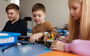 Teacher providing individualized special education support to help a child learn with confidence
