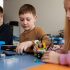 Teacher providing individualized special education support to help a child learn with confidence