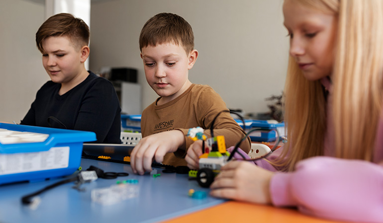 Teacher providing individualized special education support to help a child learn with confidence